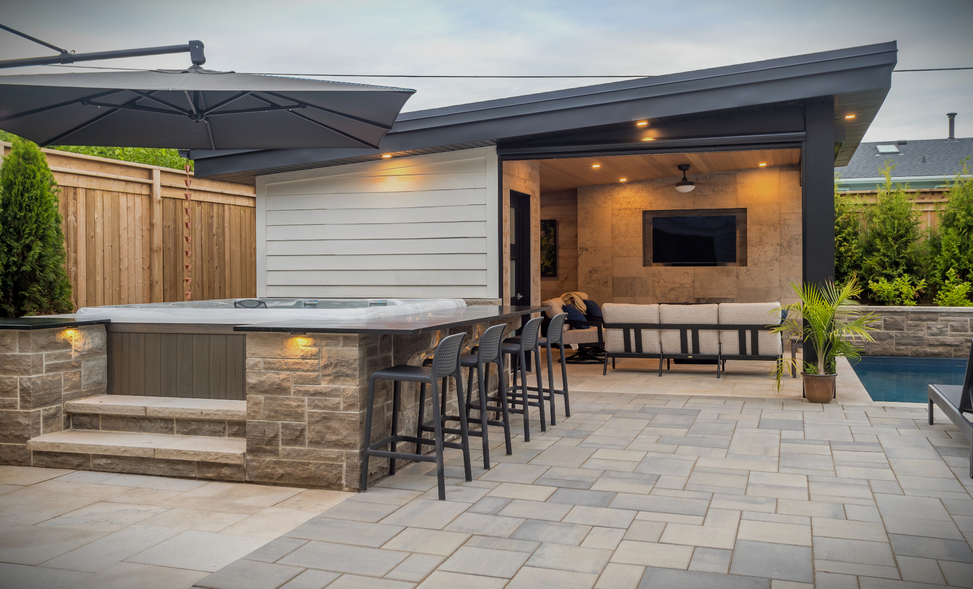 Cabana spa with bar seating and lounge