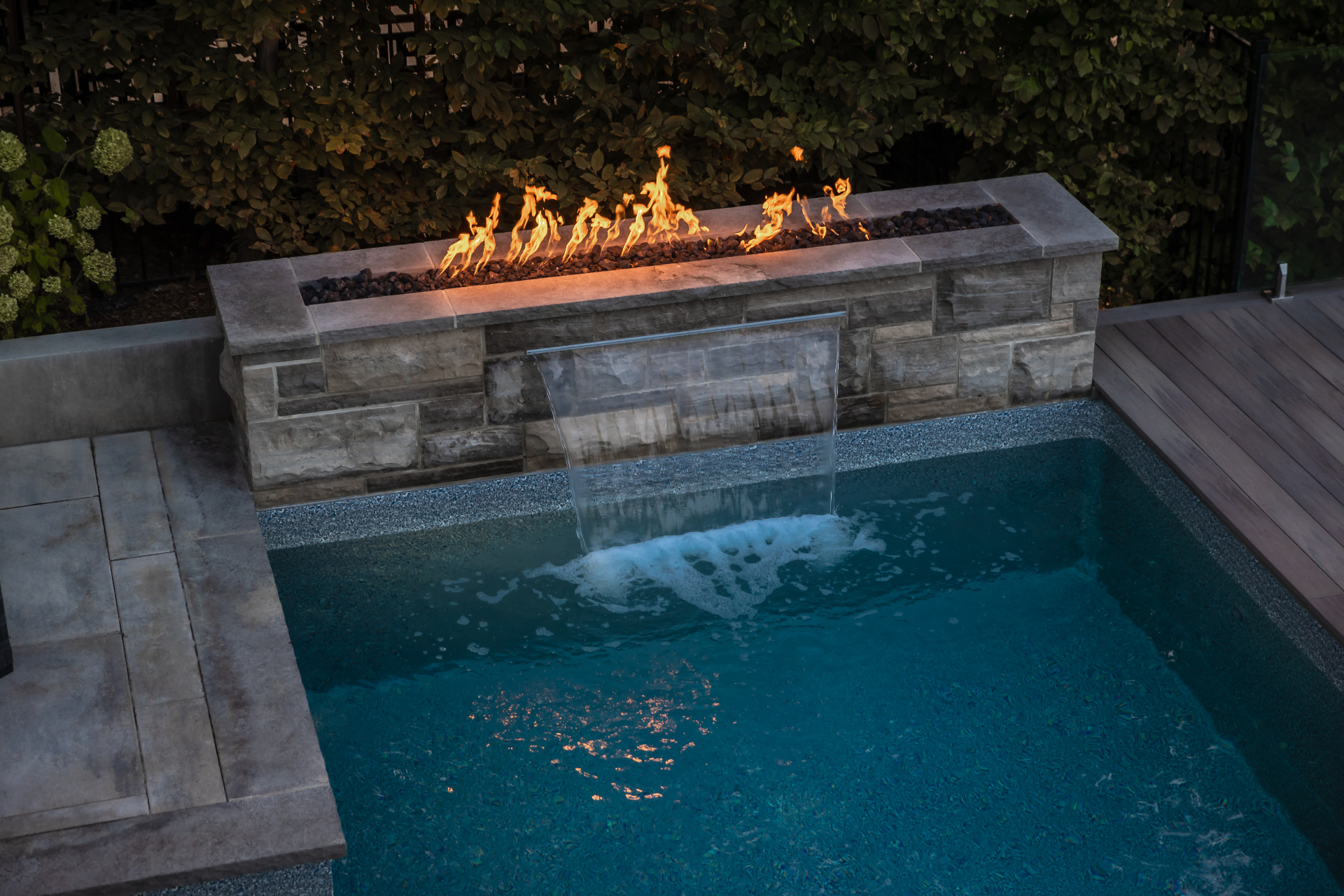 Lakeside Sanctuary — Sheer waterfall over the pool