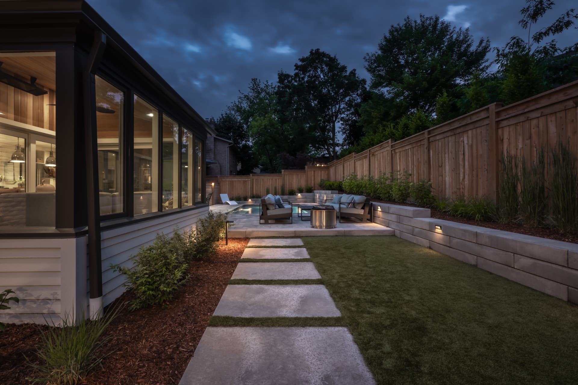 The Luxe Escape — Stone stepping path to the pool terrace