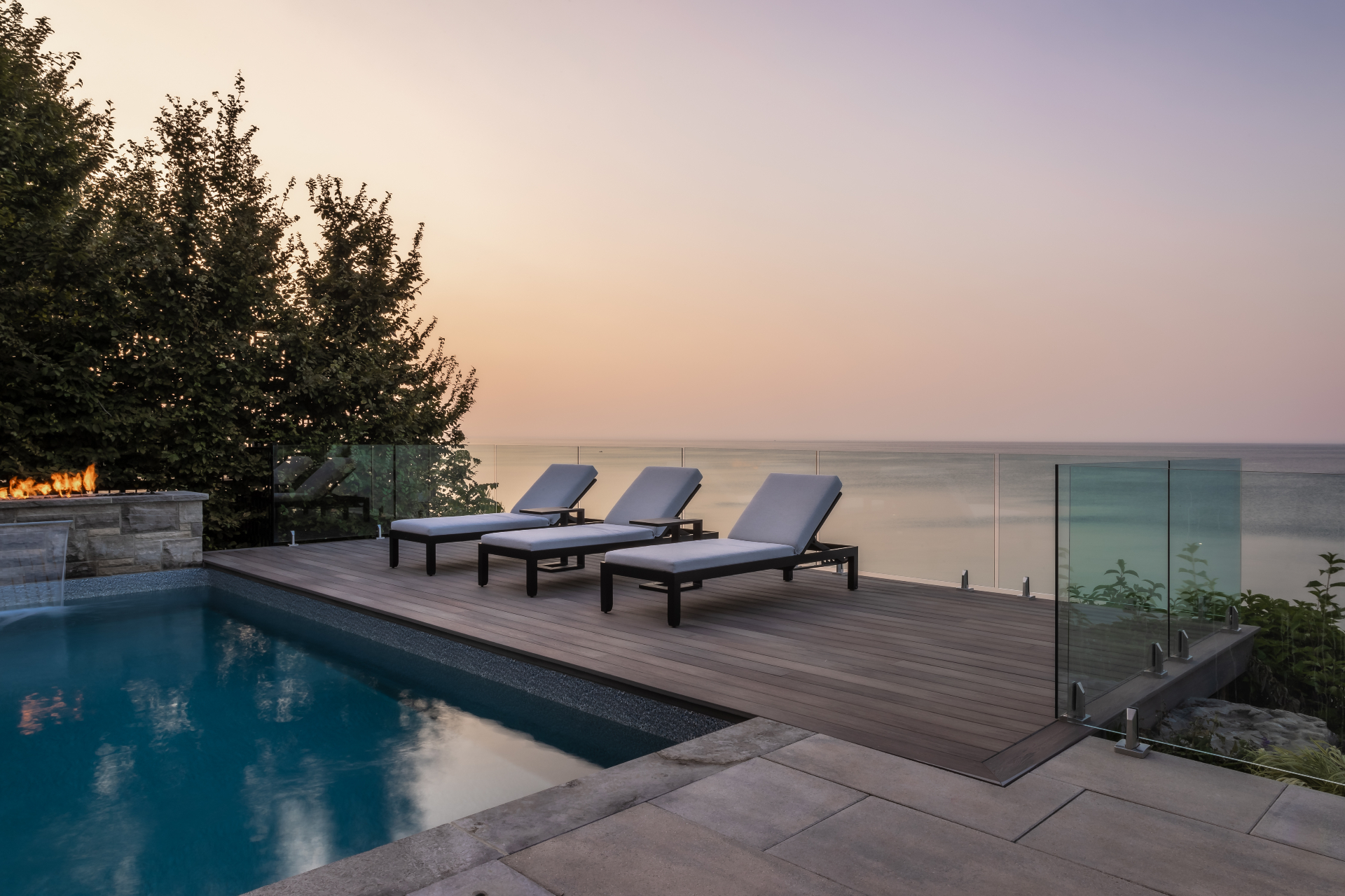 Lakeside Sanctuary — Glass-railed deck over the lake