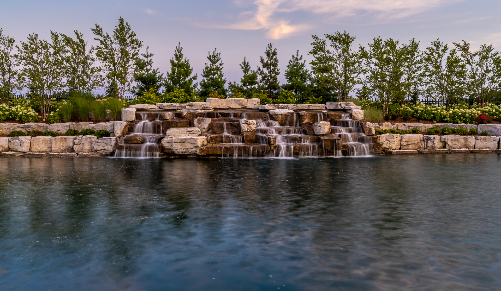 The Grand Haven — Cascading natural-stone waterfall