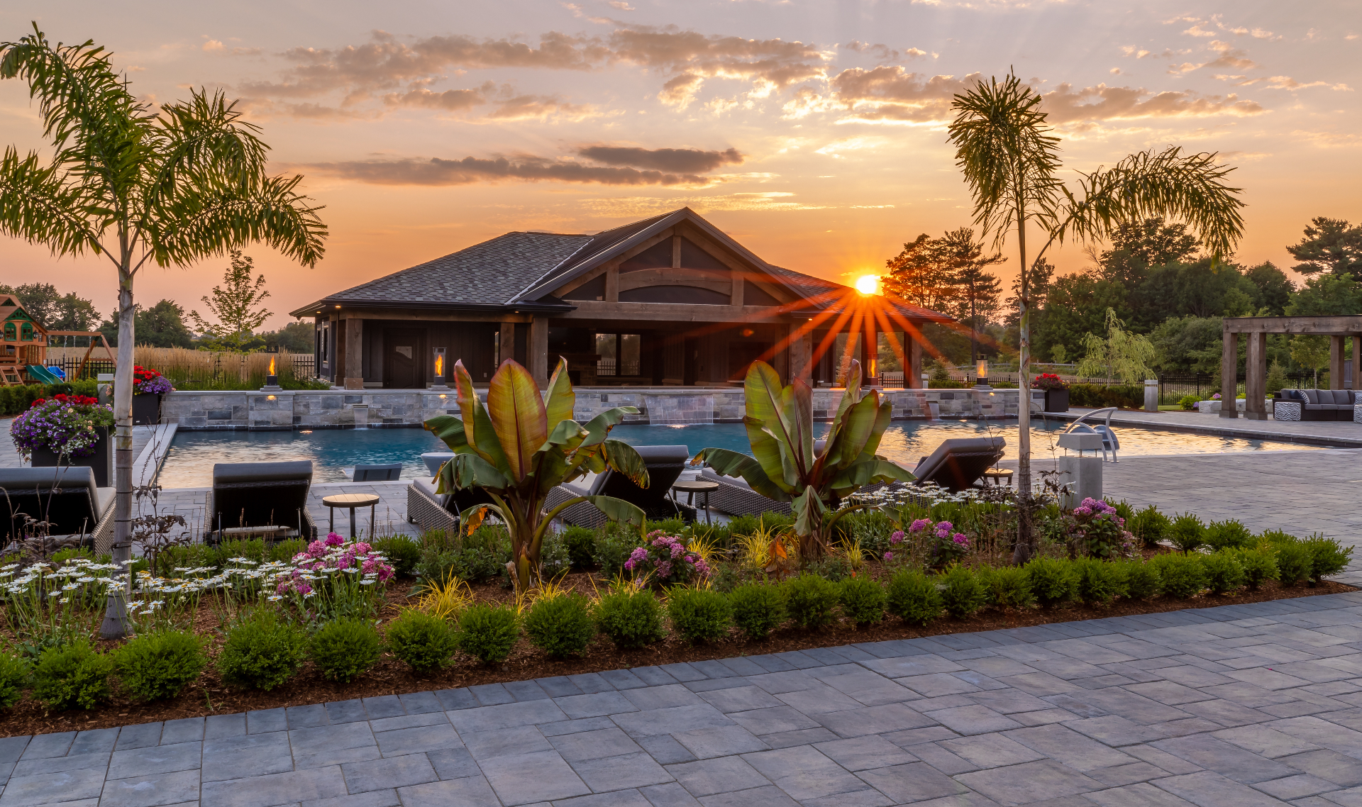 Sunset on the pool with fire features